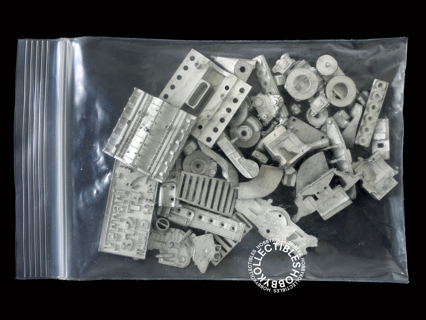 (SOLD in eBay) MFH Model Factory Hiro 1/20 Ferrari 312T4 Italian GP 2 x Body Metal Kit (MISSING 2 PARTS)